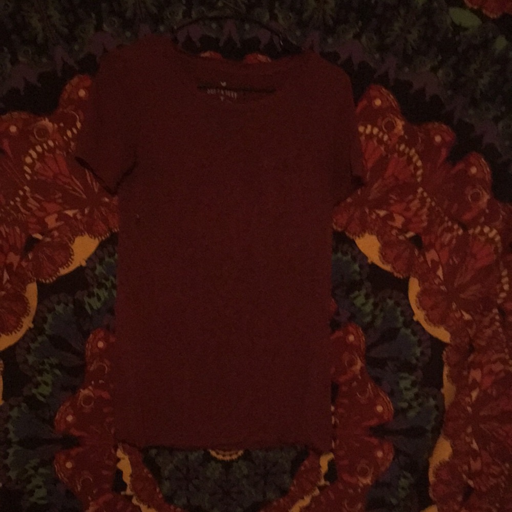 A soft maroon shirt